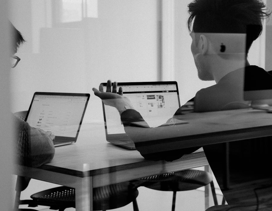 Entrepreneur and bookkeeper discussing financial growth plans